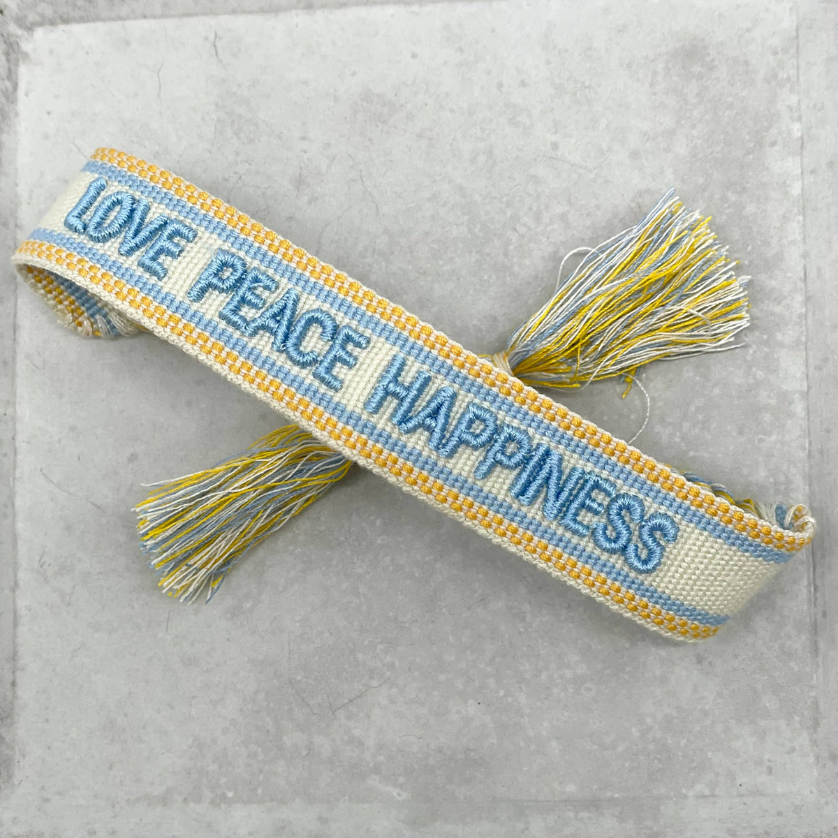 LOVE PEACE HAPPINESS statement bracelet woven, embroidered