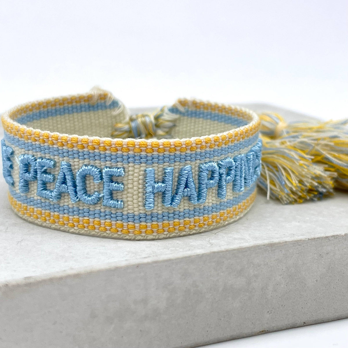 LOVE PEACE HAPPINESS statement bracelet woven, embroidered
